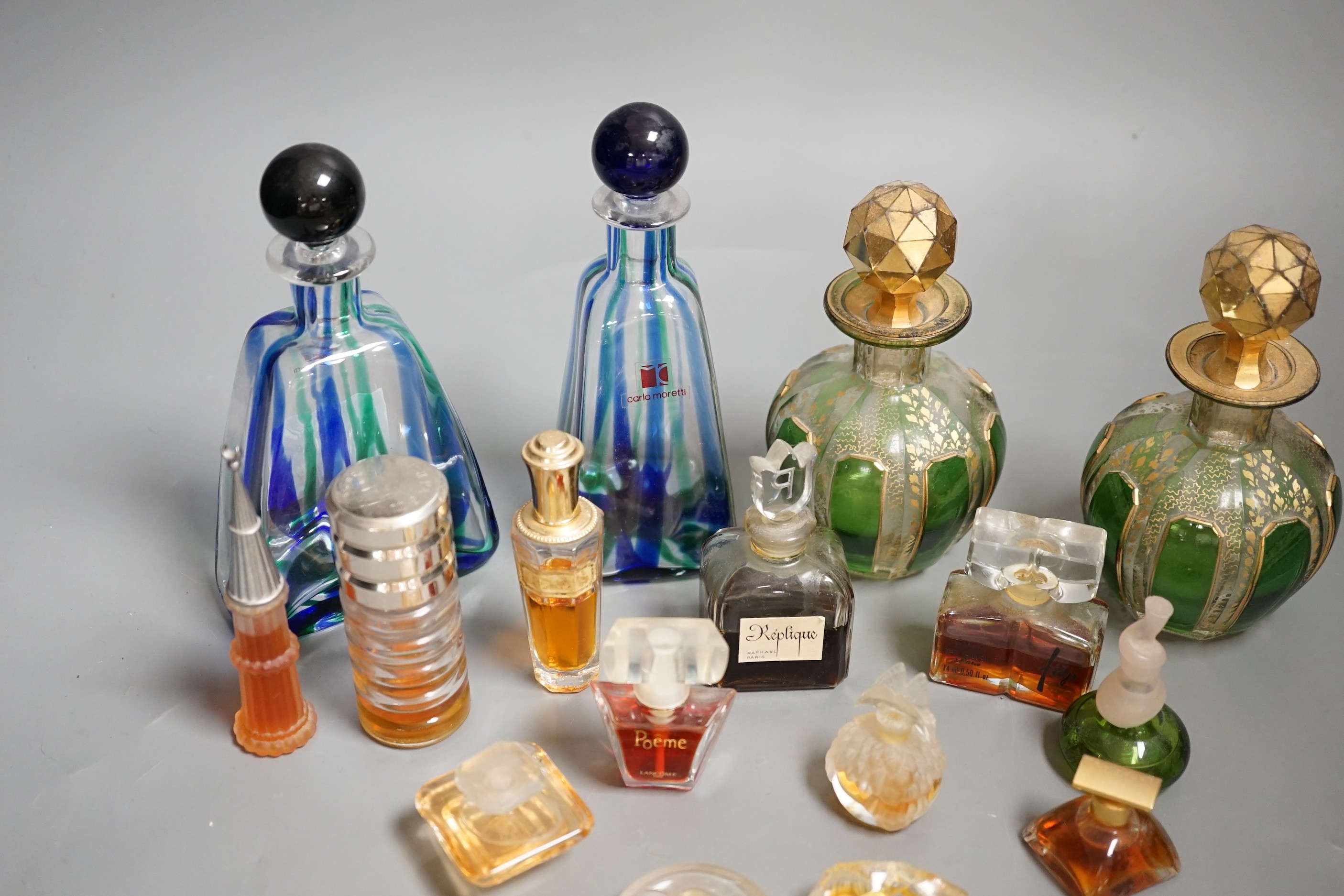 A pair of early 20th century French glass scent bottles, one other pair and miniature scent bottles (a quantity)